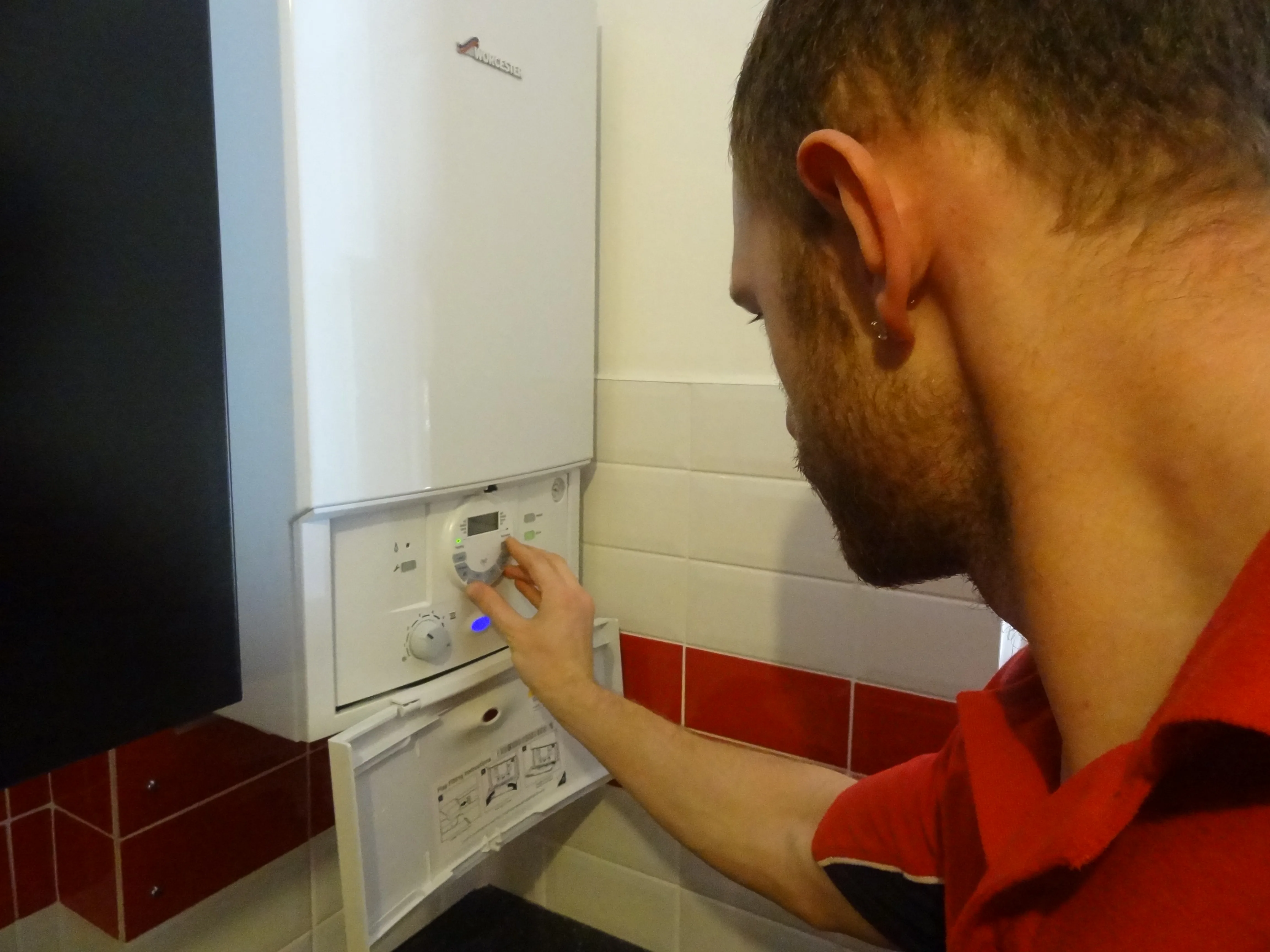 Battersea Plumbers 247 engineer working on a boiler installation in Battersea